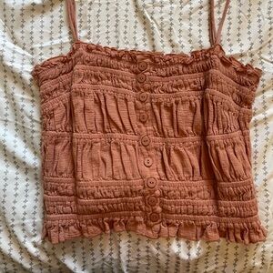 Orange strappy cropped tank